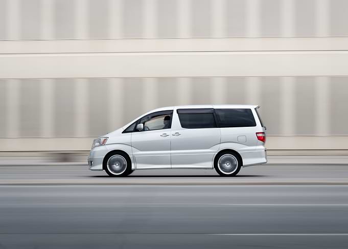 Silver Minivan Driving