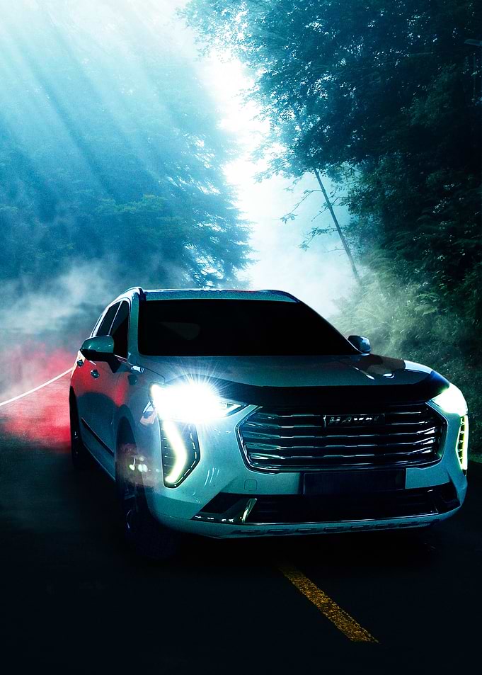White SUV on a Foggy Road