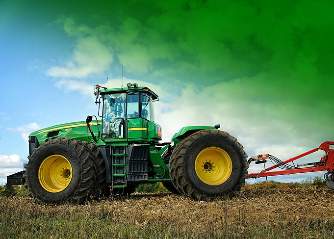 Green Tractor in Field