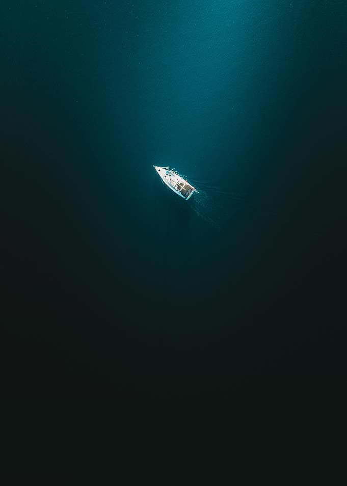 Boat on Deep Blue Water
