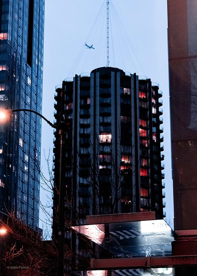 Cityscape with Airplane