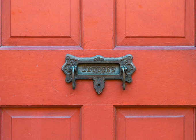 Ornate Mail Slot on Red Door