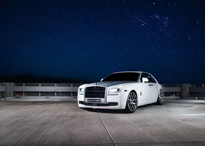White Rolls Royce Under Stars