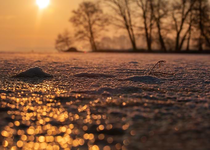 Sunset on Frozen Lake