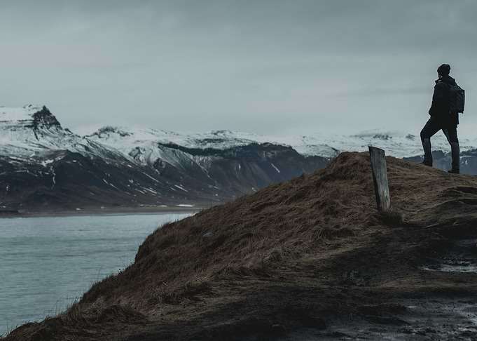 Lone Figure on a Mountainside