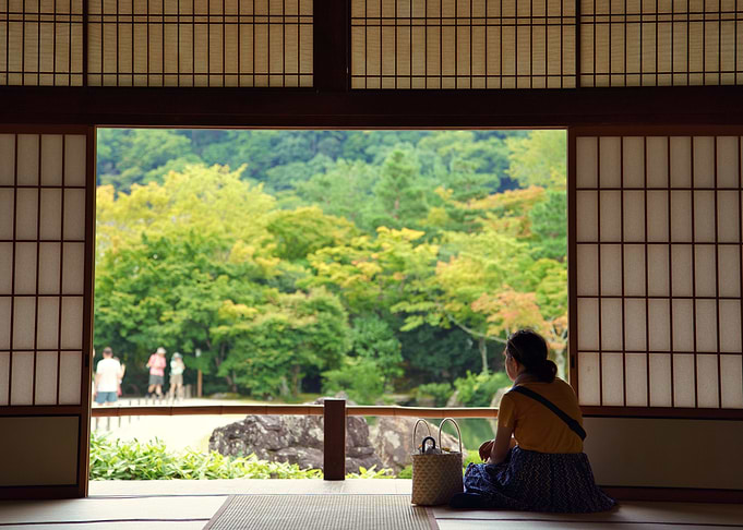 Woman Gazing at Japanese Garden