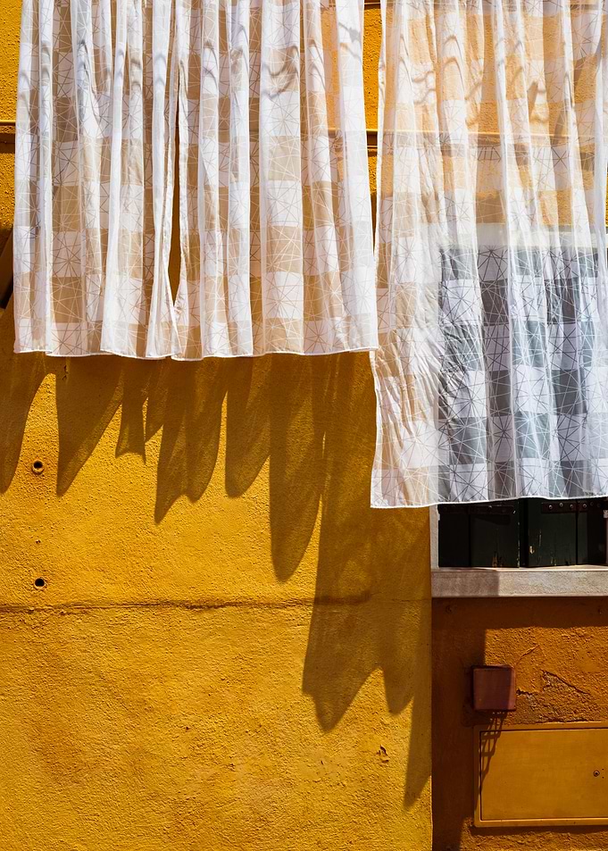Italian White Curtains on Yellow Wall