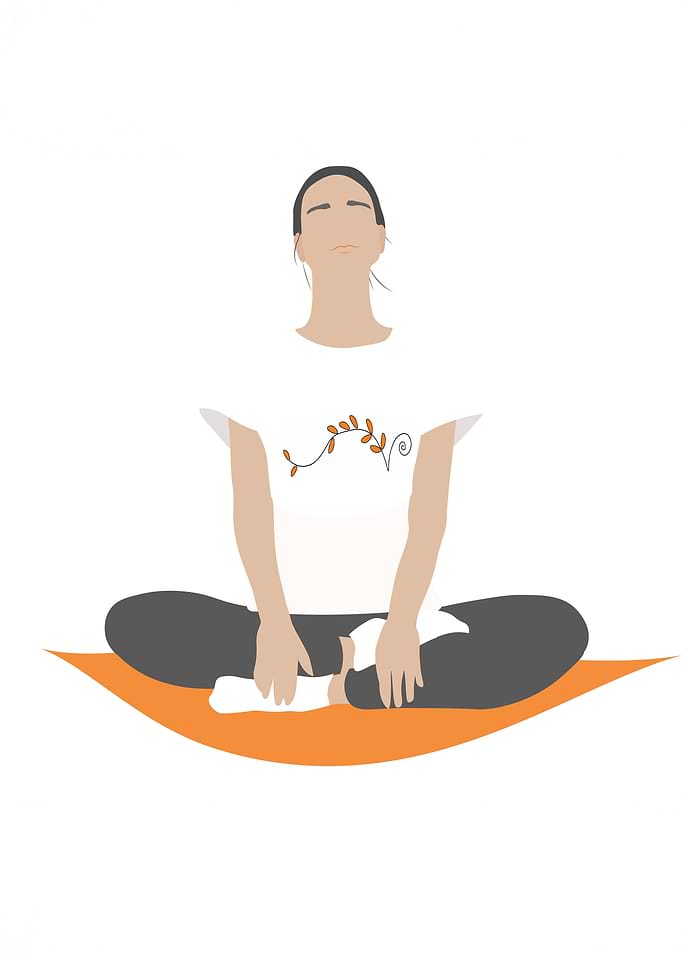 Woman Meditating in Yoga Pose