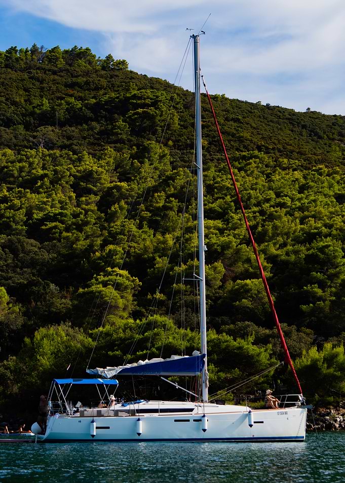 Sailboat Docked in a Cove