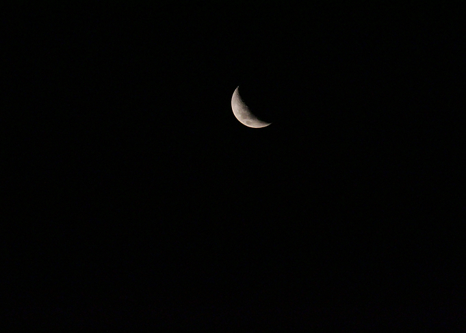Crescent Moon in Night Sky