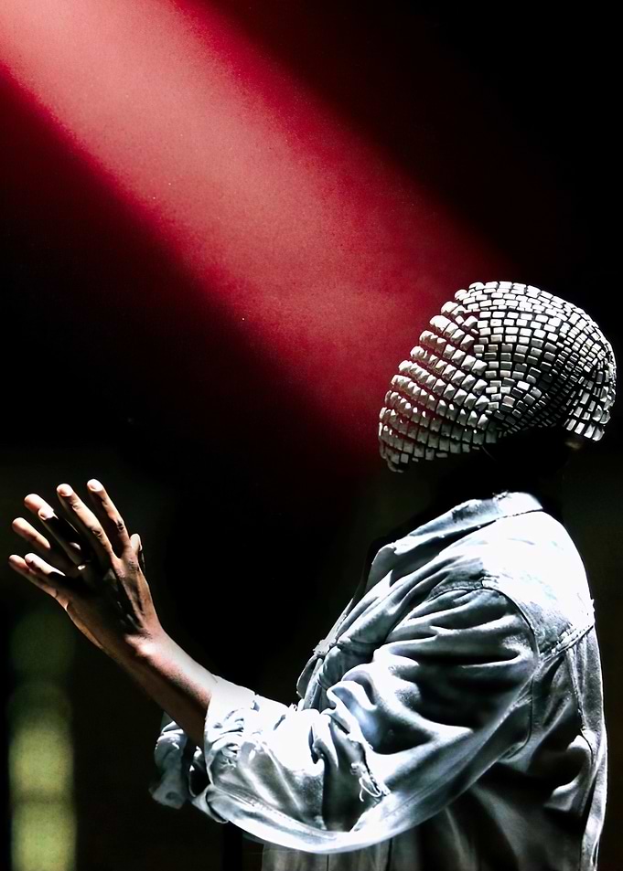 Man in Mask with Red Light kanye west music