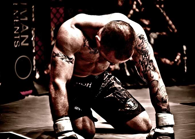 MMA Fighter Kneeling