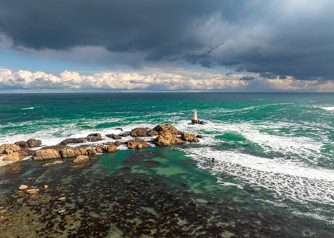 Lighthouse on Rocky Coast