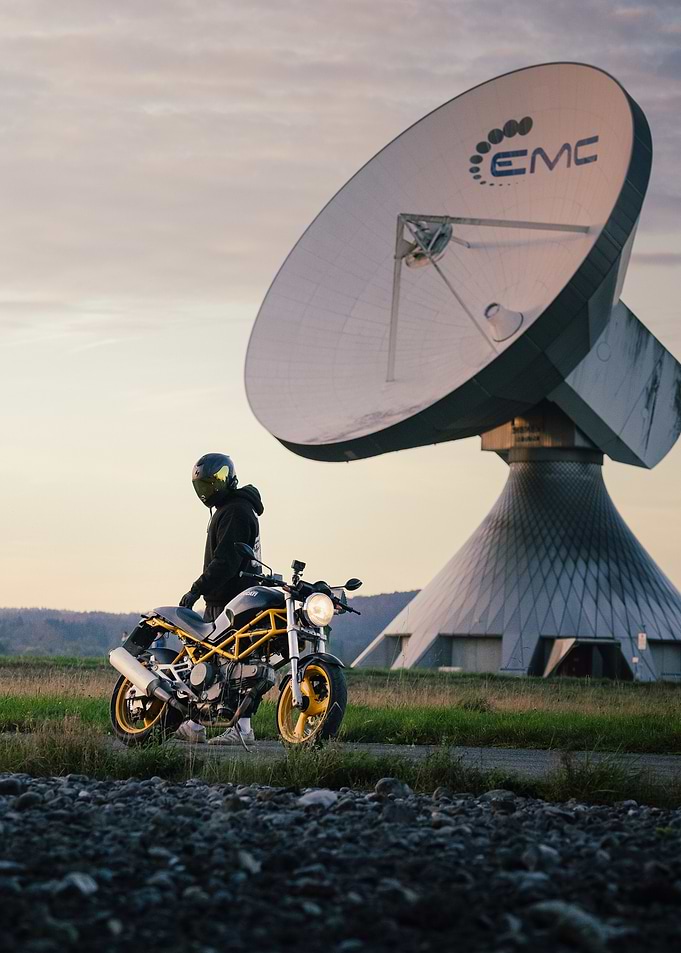 Motorcycle by Satellite Dish