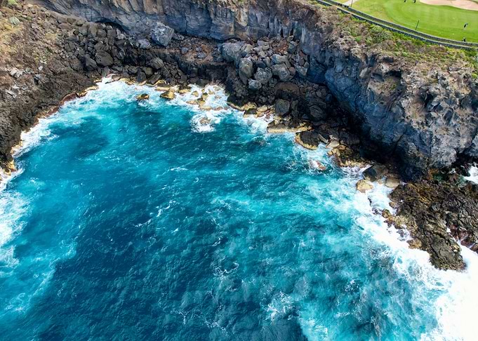 Ocean Waves Crashing on Rocks