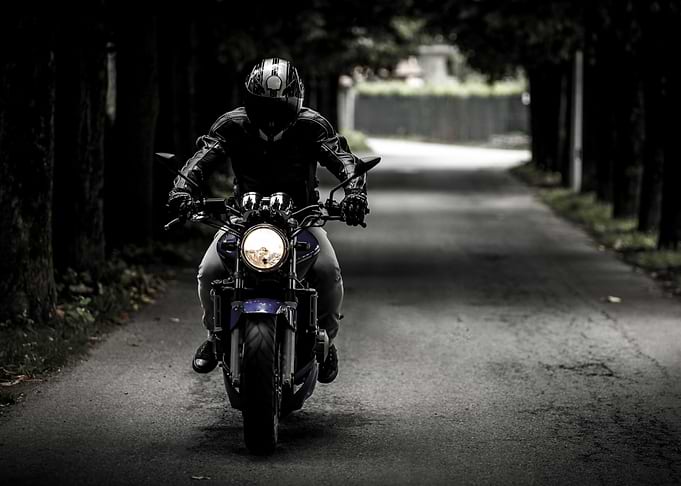 Motorcycle Rider on Road
