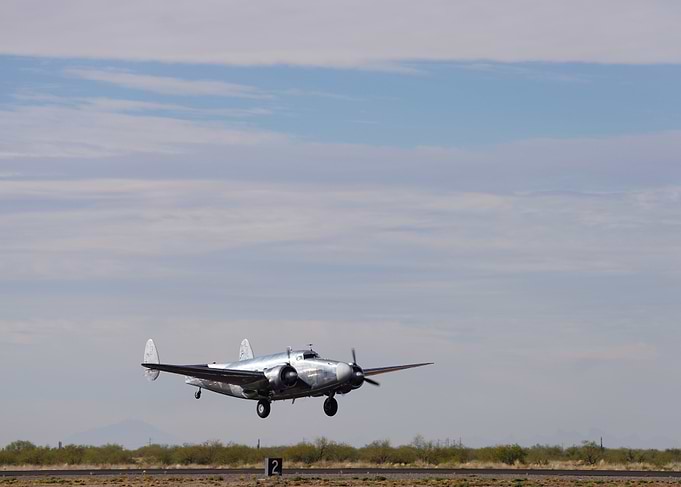 Vintage Airplane Landing Lockheed Lodestar WWII era