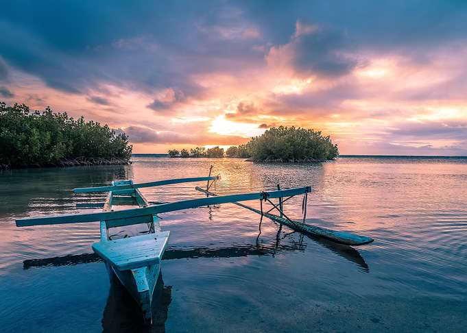 Sunset Boat in Calm Waters