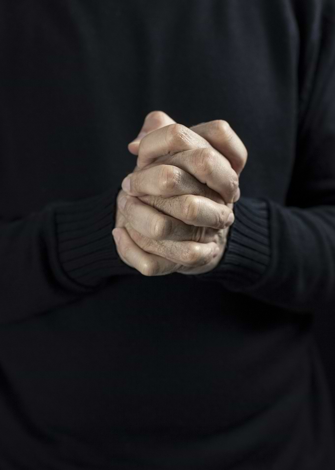 Praying old hands blackness
