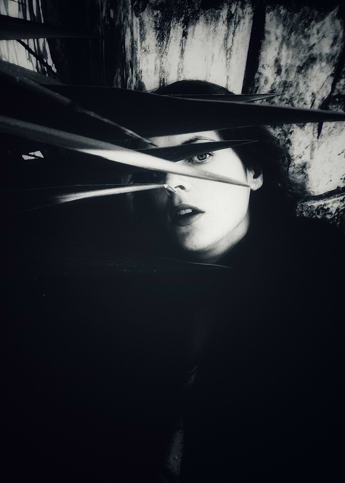 Woman Hidden by Leaves