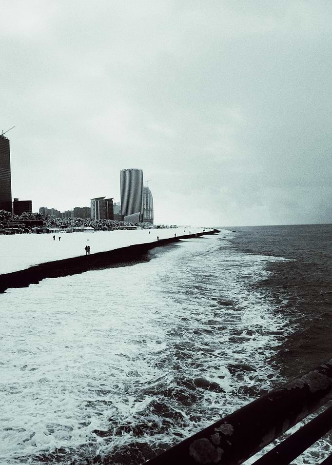 Snowy Beach Cityscape