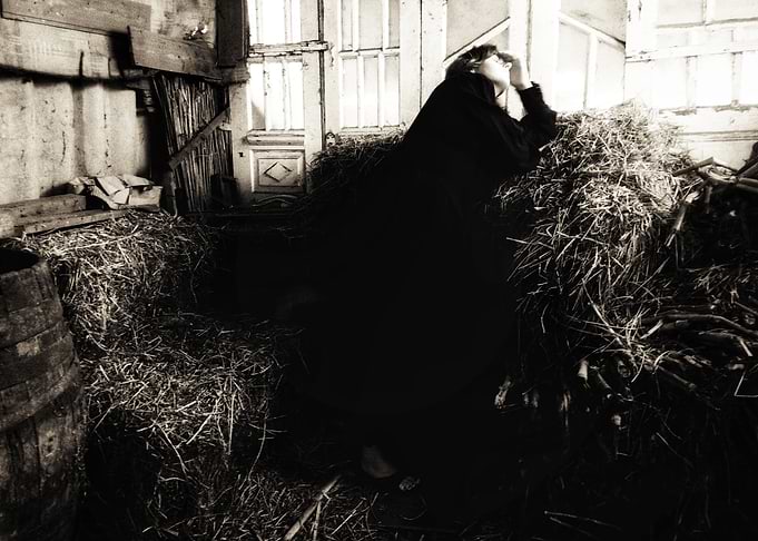 Solitary Figure in Hay