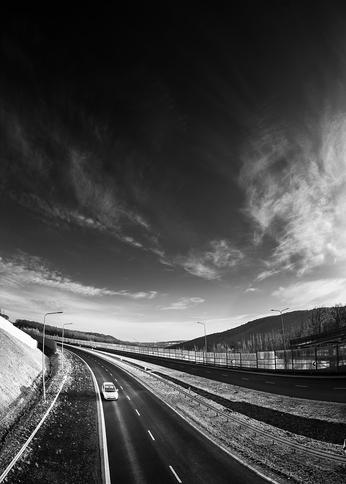 Highway Under Cloudy Sky