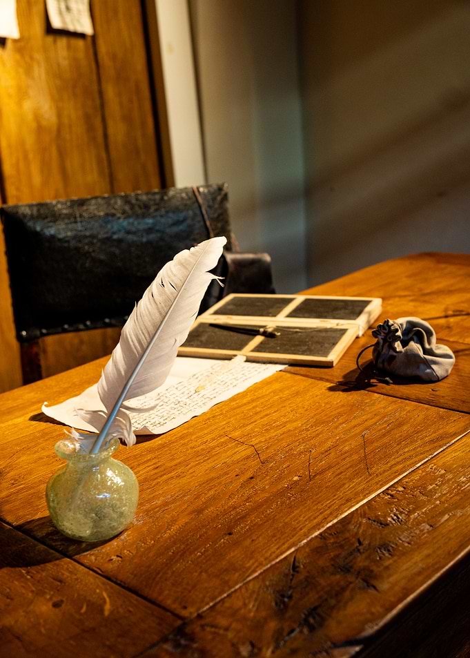 Quill Pen and Inkwell on Desk