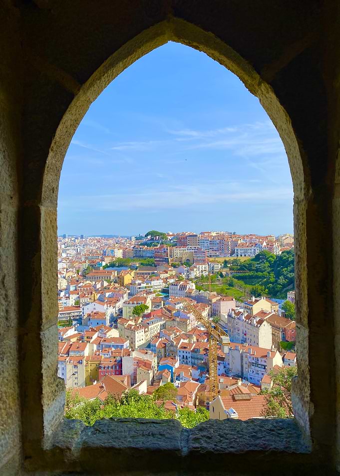 Cityscape Through Window Arch