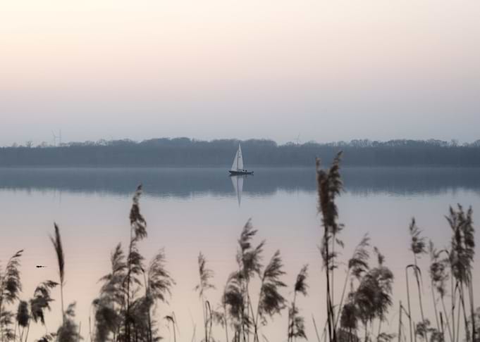 Sailboat on Calm Lake