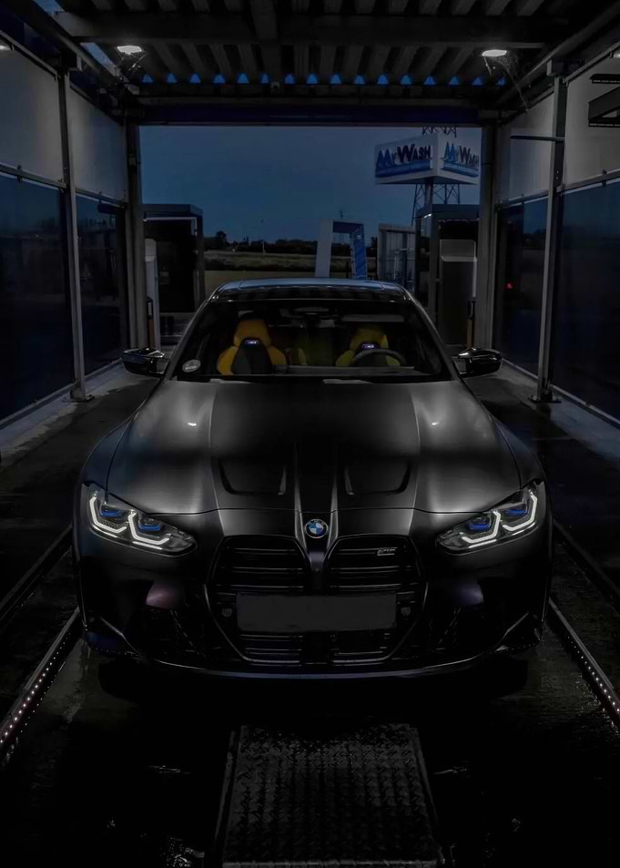 Black BMW M3 in Car Wash