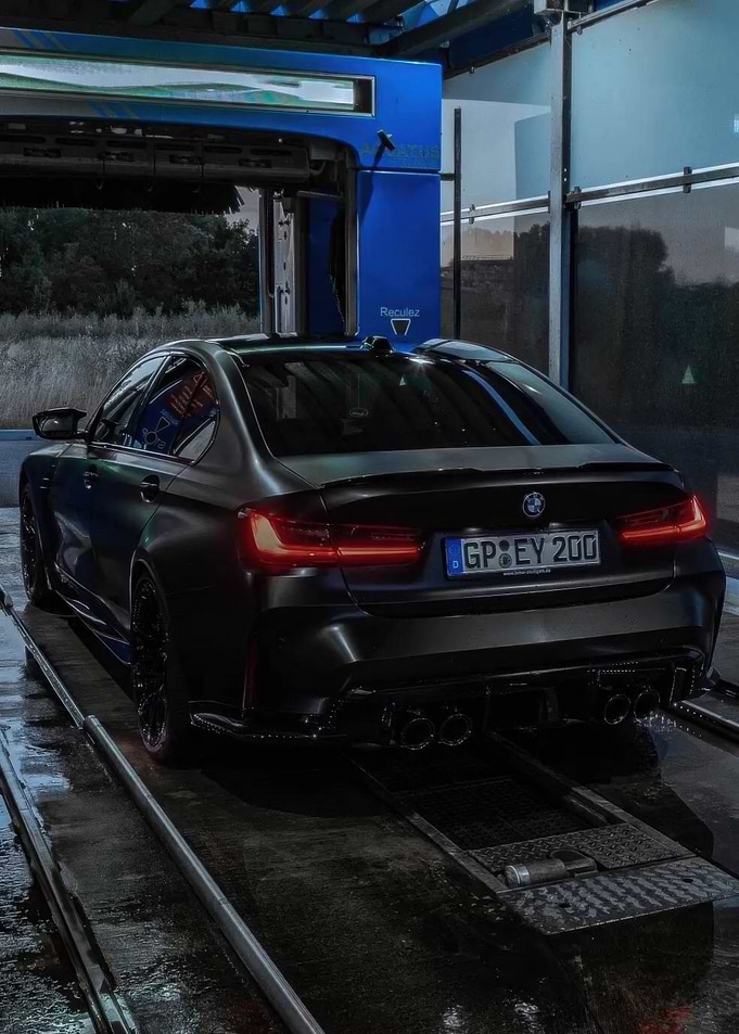 Black BMW M3 in Car Wash