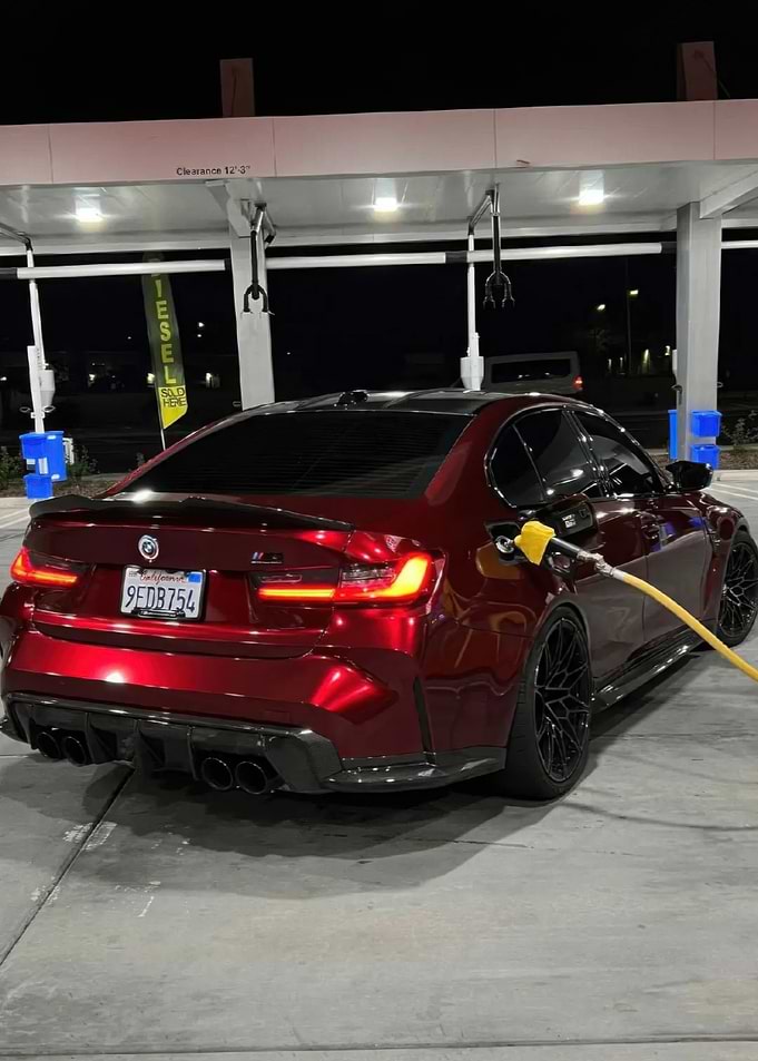 Red BMW M3 at Gas Station