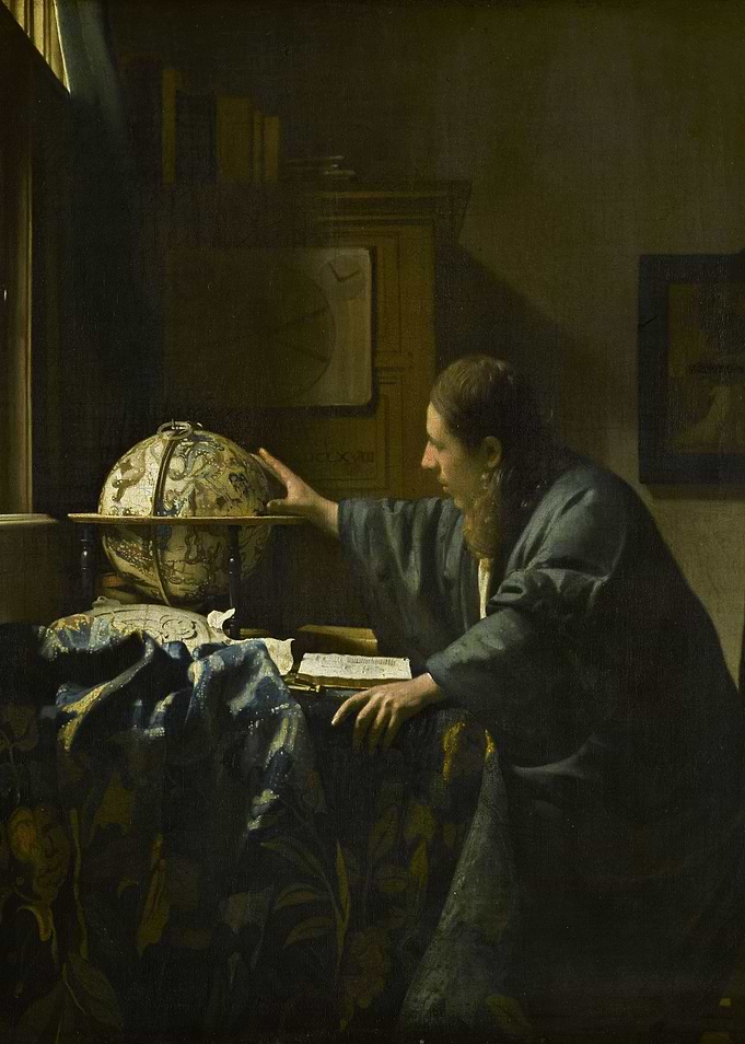 Woman Studying a Globe