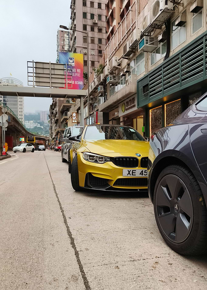Yellow BMW M3 in Hong Kong