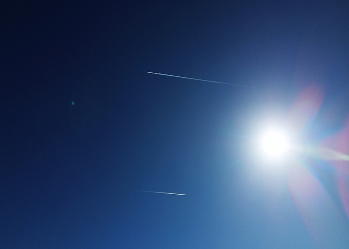 Bright Blue Sky with Contrails
