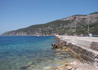 Coastal View with Pier and Boats