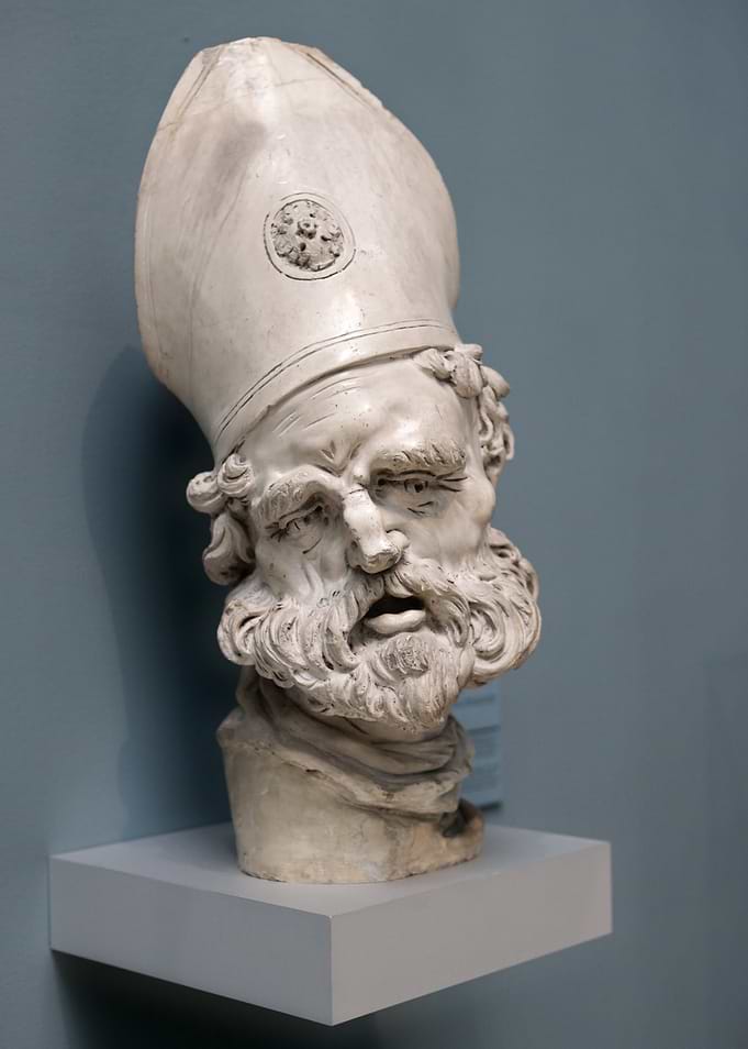 Sculpture of a bearded man with mitre