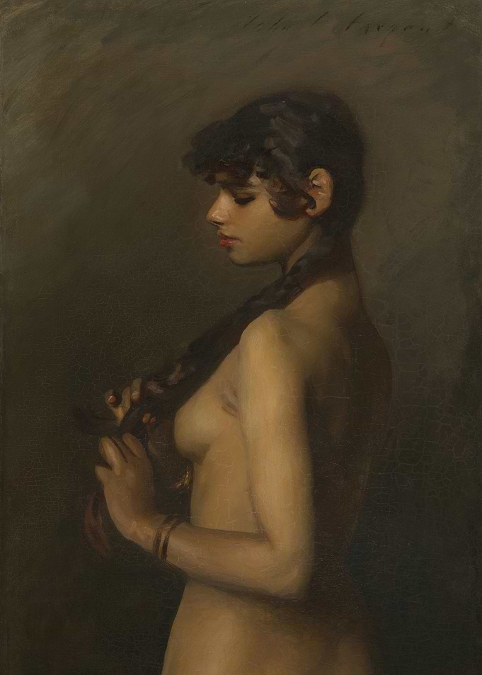 Young Woman Braiding Her Hair