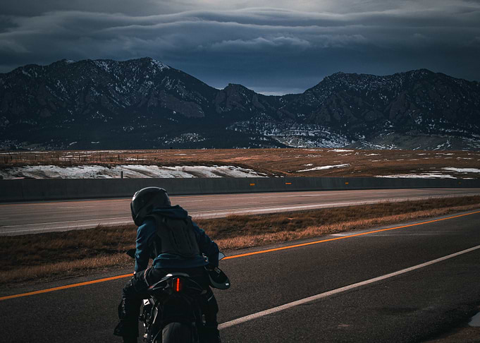 Motorcycle ride with mountain backdrop