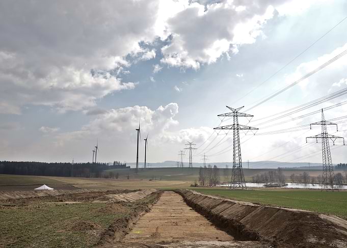 Wind Turbines and Power Lines Landscape