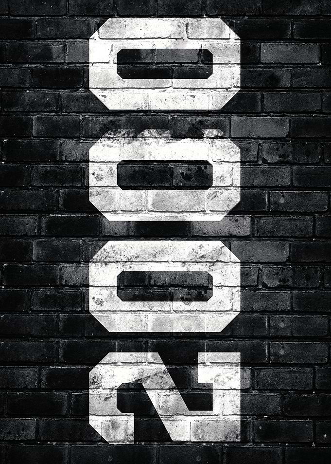 2021 White Numbers on Brick Wall