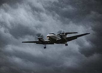 Turboprop plane landing in stormy weather
