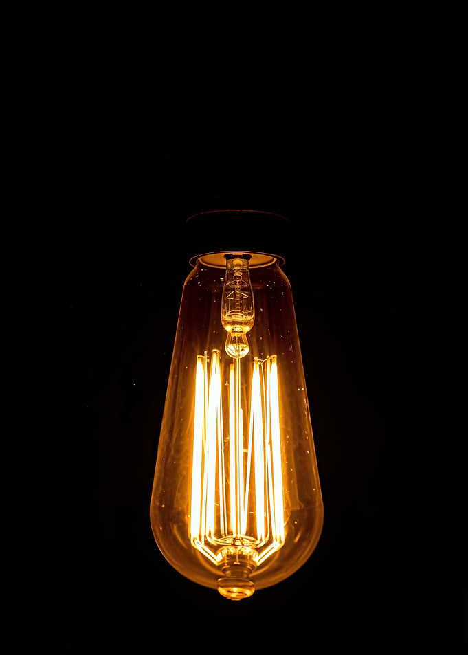 Edison Bulb on Black Background