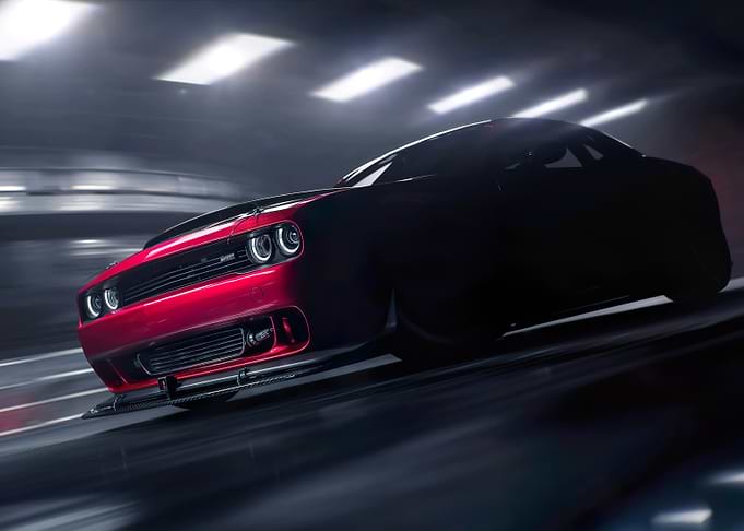 Red Dodge Challenger in Motion
