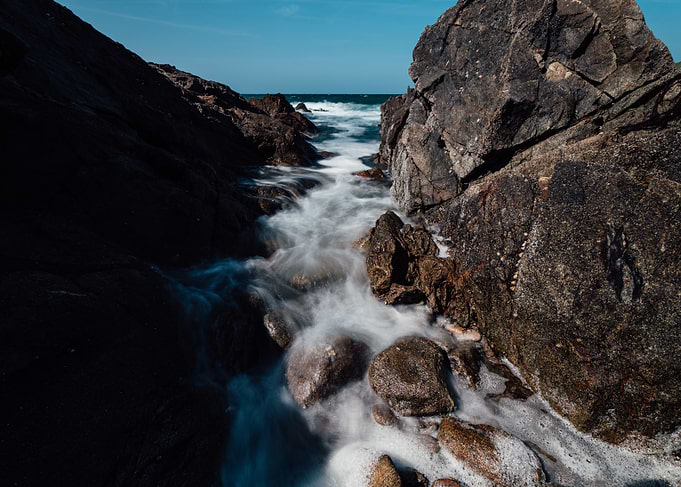 Rocky Coastline with Flowing Water in France