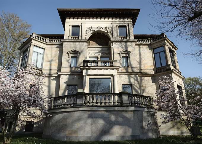 Elegant Stone Mansion with Balconies