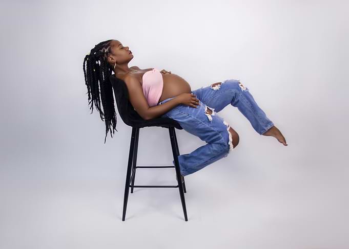 Pregnant Woman on Stool