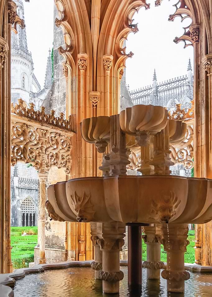 Beautiful Medieval Gothic Fountain in the Royal Cloister of the Monastery of Batalha, Portugal