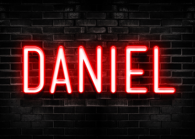 Daniel Neon Sign on Brick Wall